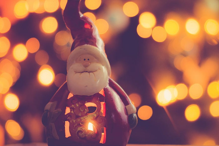 Glowing Santa Claus Lantern with Bokeh Lights