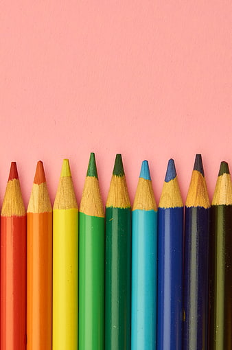 Colorful Colored Pencils on Pink Background