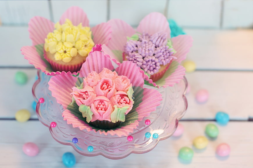 Pastel Floral Cupcakes on Pink Glass Stand with Easter Eggs