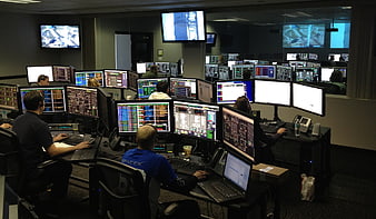 SpaceX Mission Control Center with Engineers Monitoring Screens