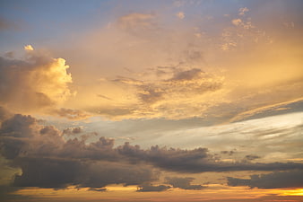 Dramatic Golden Sunset Sky with Layered Clouds