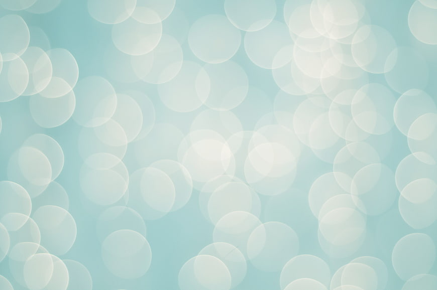 Abstract Light Blue Bokeh Background with Soft White Circles