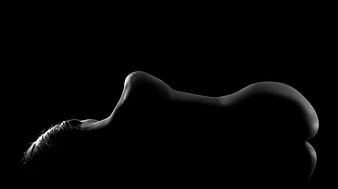 Black and white silhouette of a woman's body profile