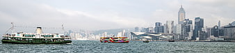 Panoramic View of Hong Kong Skyline and Victoria Harbour Ferries