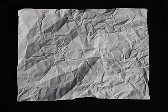 Crumpled White Paper Texture On Black Background