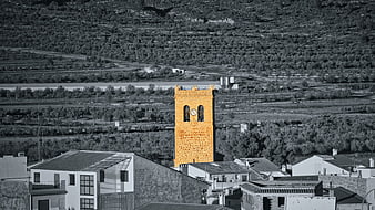 Selective Color Church Tower in Spanish Village Landscape
