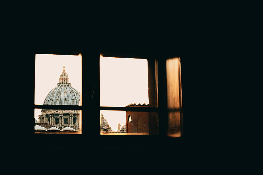 St. Peter's Basilica Dome View Through Dark Window Frame