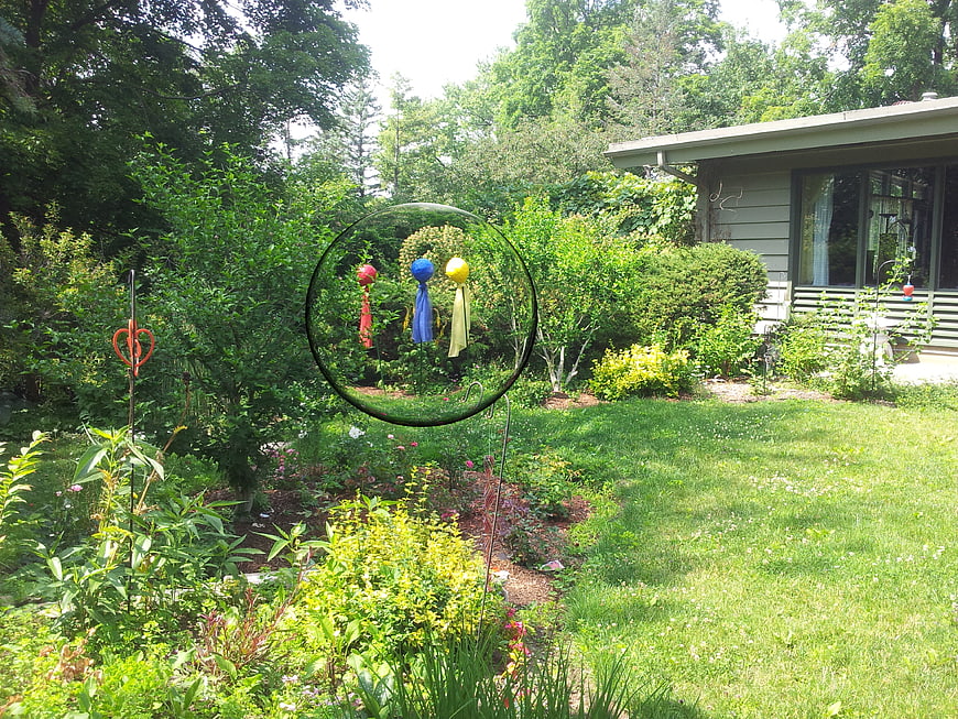 Colorful Balloon Garden Ornaments in Green Yard