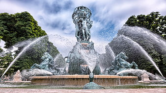 Grand Bronze Fountain with Horses and Atlas Statue in Park