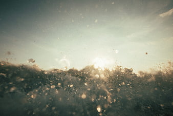Ocean Water Splash Backlit by Sunlight