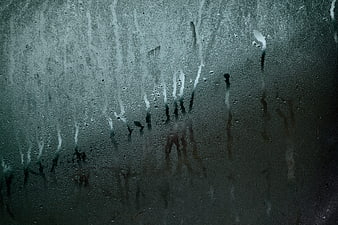 Moody Raindrops on Frosted Glass Window Texture