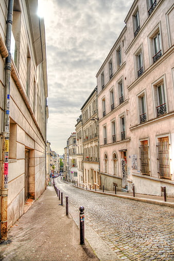 Cobblestone Street in Paris with Classic Architecture