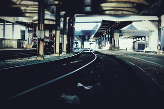 Empty Train Station Tracks with Leading Lines Perspective