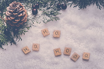 Christmas Scrabble Tiles Spelling Ho Ho Ho in Snow