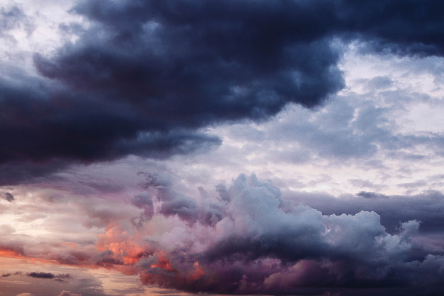 Dramatic Storm Clouds at Sunset with Moody Atmosphere