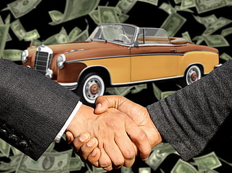 Business handshake with classic car and falling money background