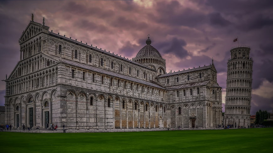 Dramatic Leaning Tower of Pisa and Cathedral at Sunset