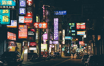 Vibrant Asian Chinatown Street at Night with Neon Signs