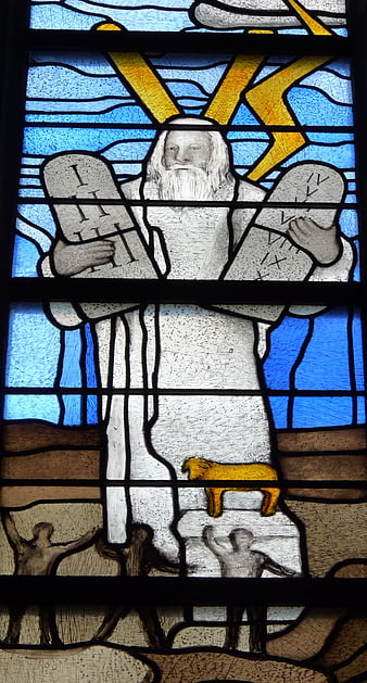 Stained Glass Window Depicting Moses Holding The Ten Commandments