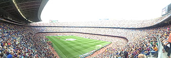 Panoramic View of Camp Nou Stadium with Football Pitch and Crowd