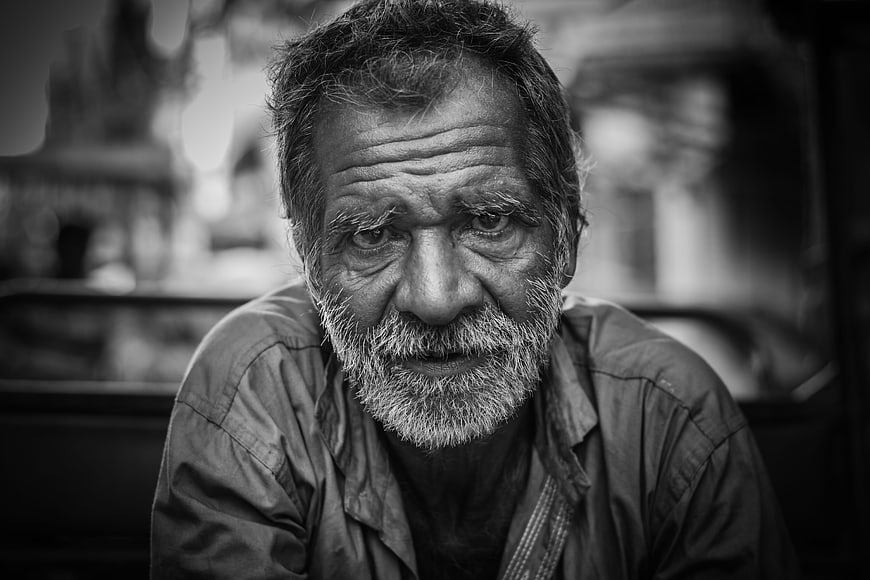 Black and white portrait of elderly man with beard