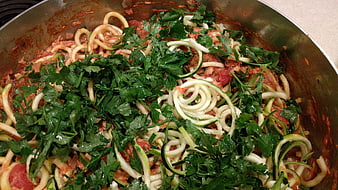 Zucchini Noodles With Fresh Parsley And Tomato Sauce In Metal Pan