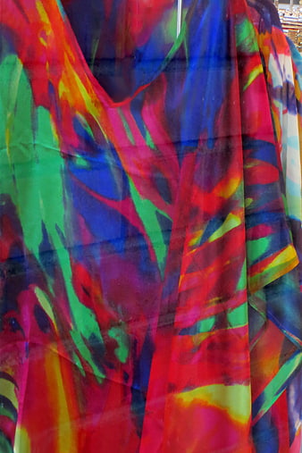 Vibrant multicolored sheer fabric texture close-up