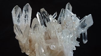 Clear Quartz Crystal Cluster on Black Background