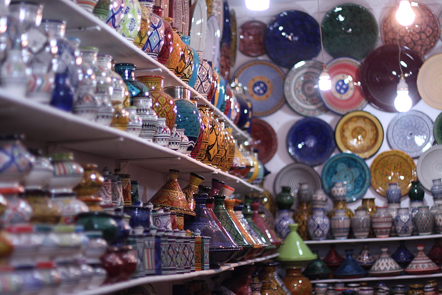 Colorful Moroccan ceramic pottery and plates in a shop