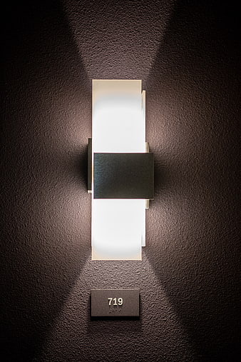 Modern Minimalist Wall Sconce with Room Number 719