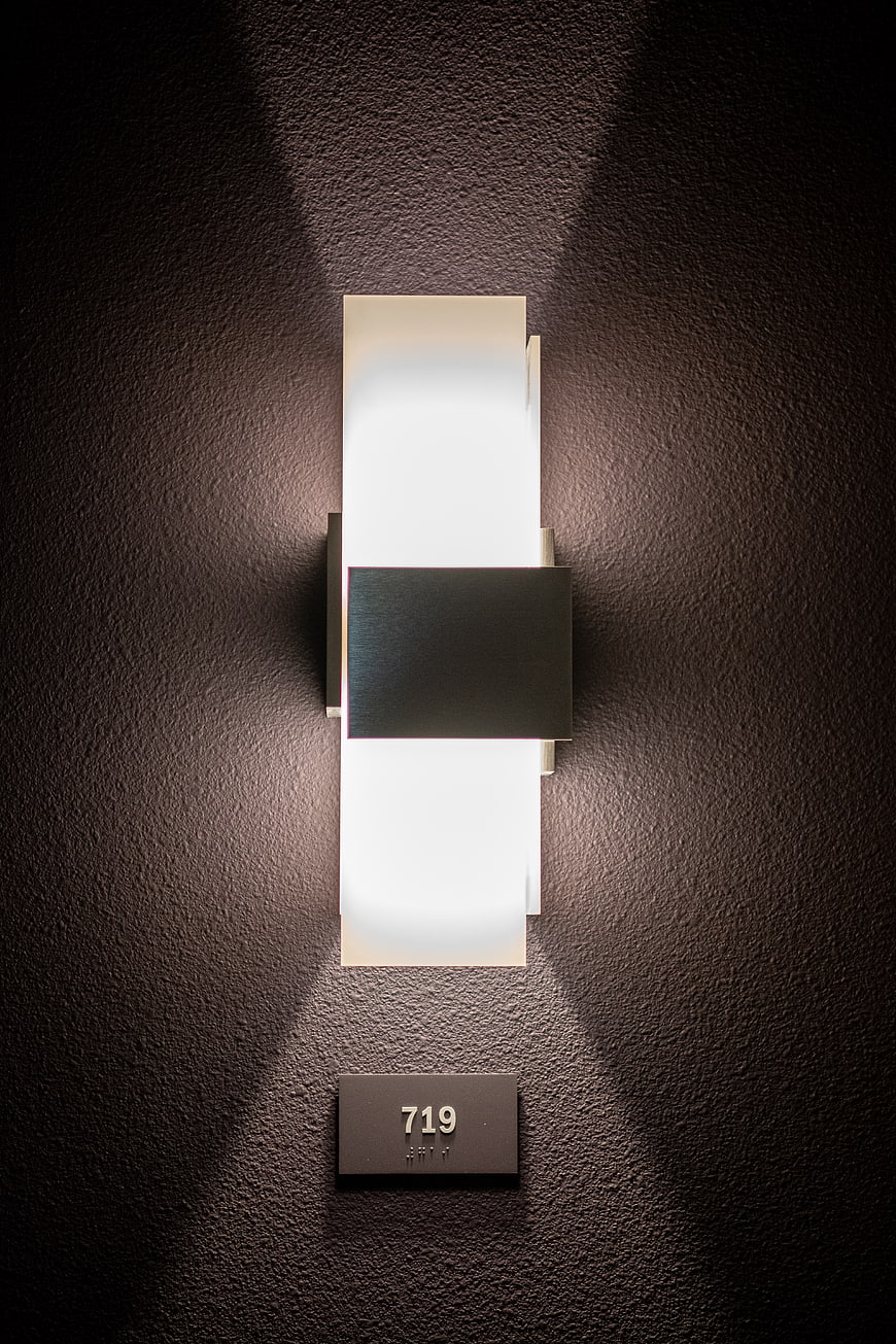 Modern Minimalist Wall Sconce with Room Number 719