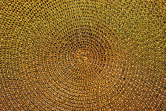 Golden spiral metal mesh texture background
