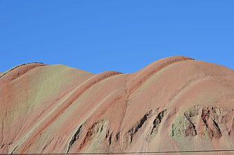 Colorful Rainbow Mountains Landscape Under Blue Sky
