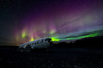 Aurora Borealis over Crashed DC-3 Plane in Iceland