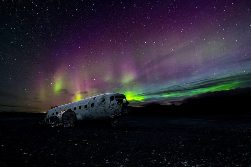 Aurora Borealis over Crashed DC-3 Plane in Iceland