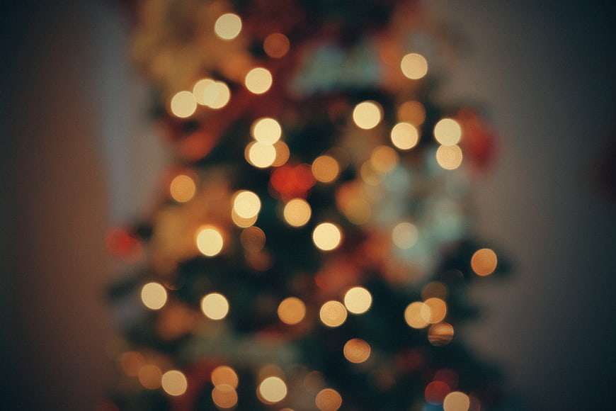 Blurred Christmas Tree With Warm Bokeh Lights