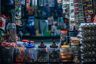 Colorful Indian street shop display with candies and eggs