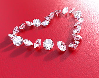 Diamonds Arranged in Heart Shape on Red Leather Background