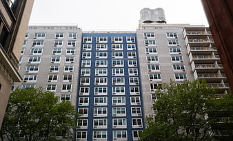 Modern Apartment Building with Blue and Gray Facade