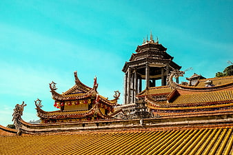 Traditional Chinese Temple Architecture with Yellow Roof Tiles