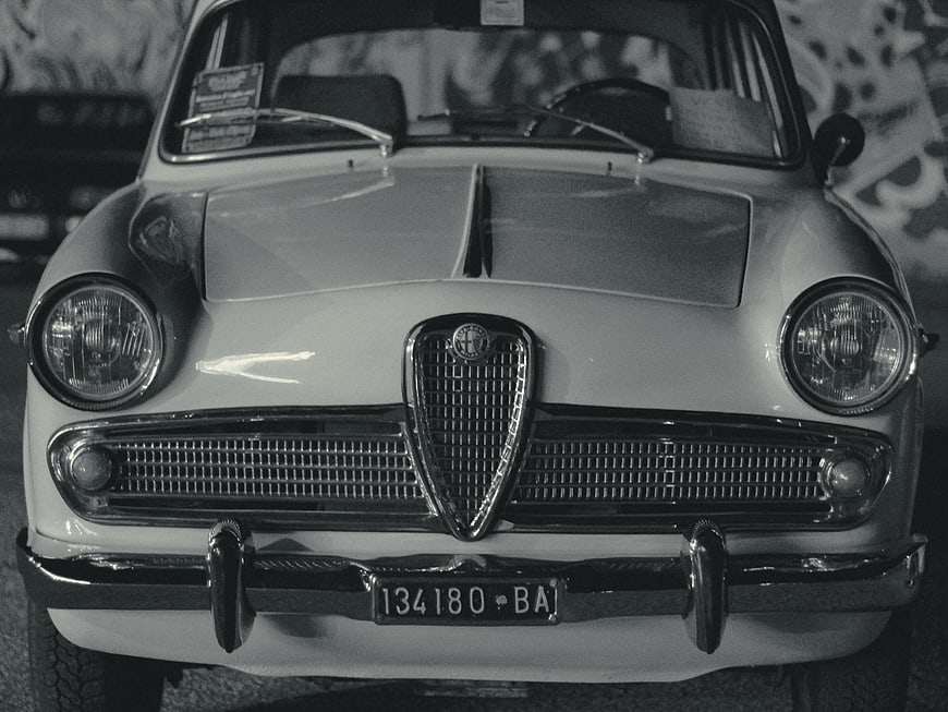 Front view of vintage Alfa Romeo Giulietta in black and white