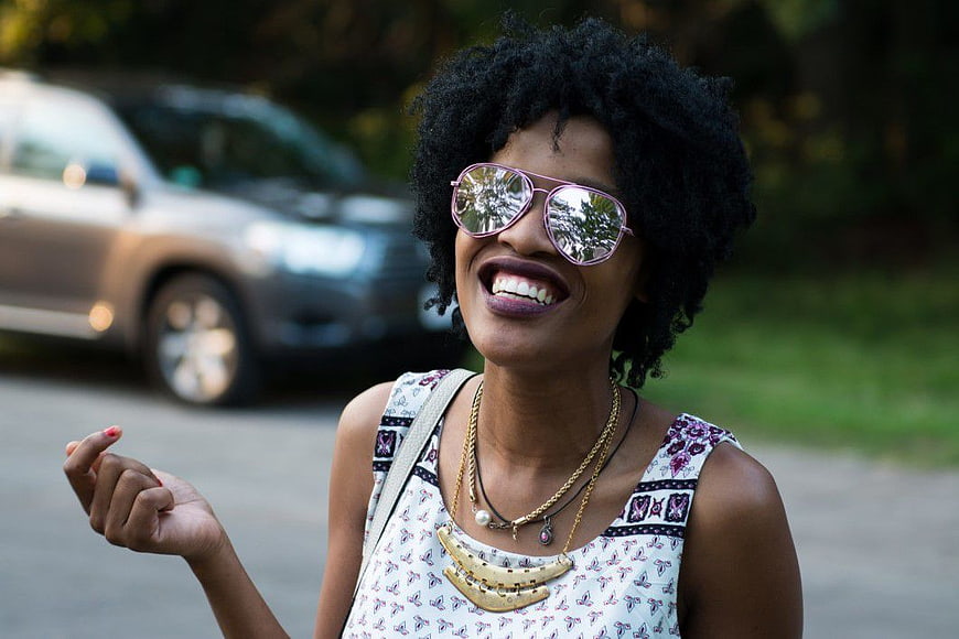 Happy African American Woman Wearing Sunglasses Outdoors