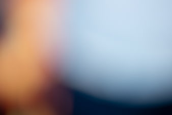 Abstract Blurred Gradient Background with Orange and Blue Hues