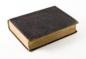Vintage leather-bound book isolated on white background