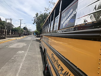 Yellow Public Bus on Street in Ometepe Nicaragua