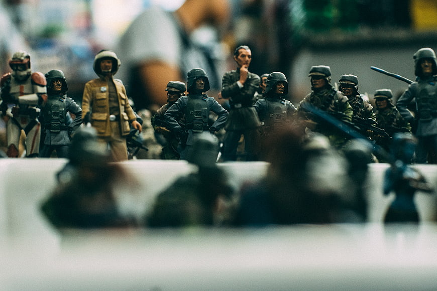 Collection of miniature military action figures and toy soldiers