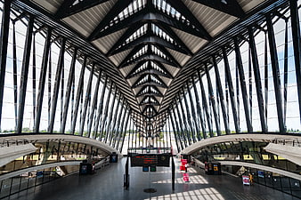 Modern Architectural Interior with Steel Beams and Glass Walls