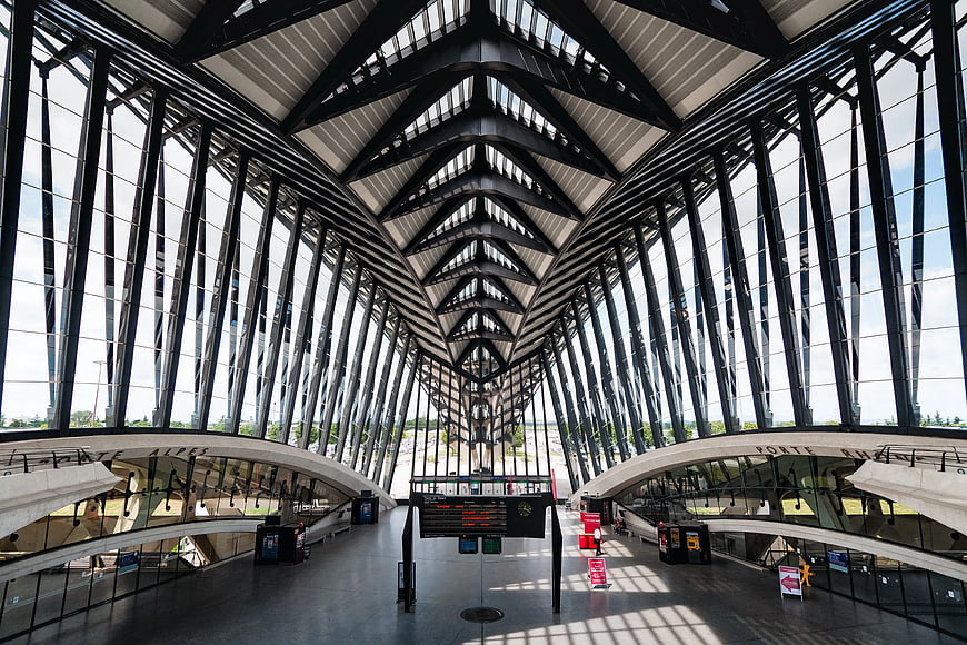 Modern Architectural Interior with Steel Beams and Glass Walls