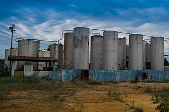 Abandoned Industrial Factory with Concrete Silos