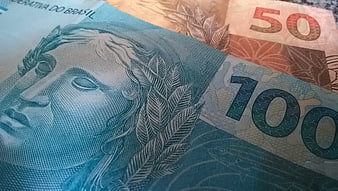 Close-up of Brazilian Real banknotes, 100 and 50 reais